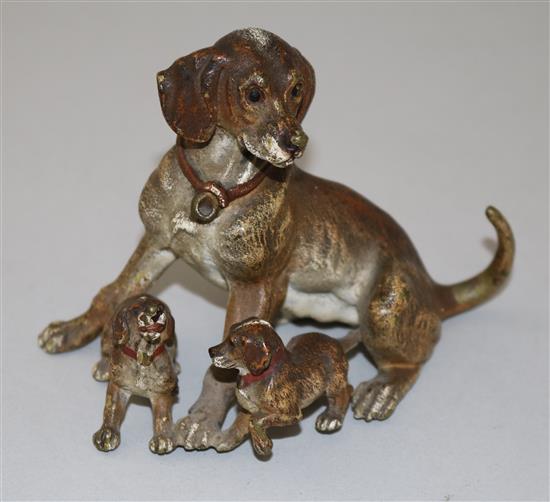 A late 19th century Austrian cold painted bronze group of a dog with two pups, H.3.25in.